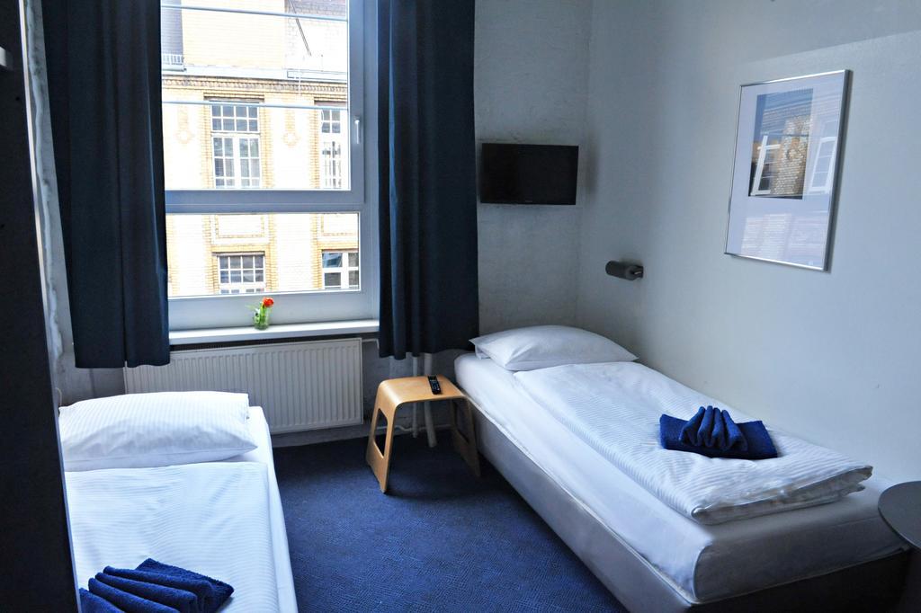 Hotel Transit Berlim Quarto foto